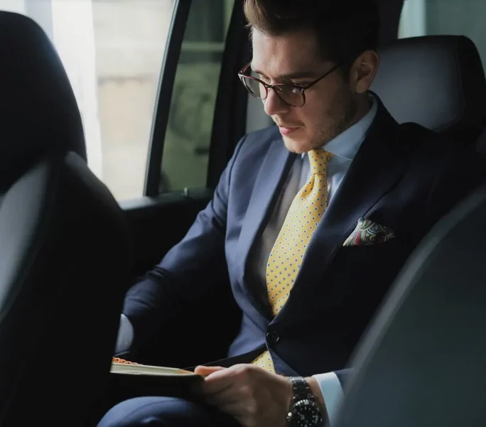 Businessman-in-car-roadshow-london-chauffeur